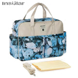 Premium Waterproof Diaper Bag - The Next Door Neighbor 